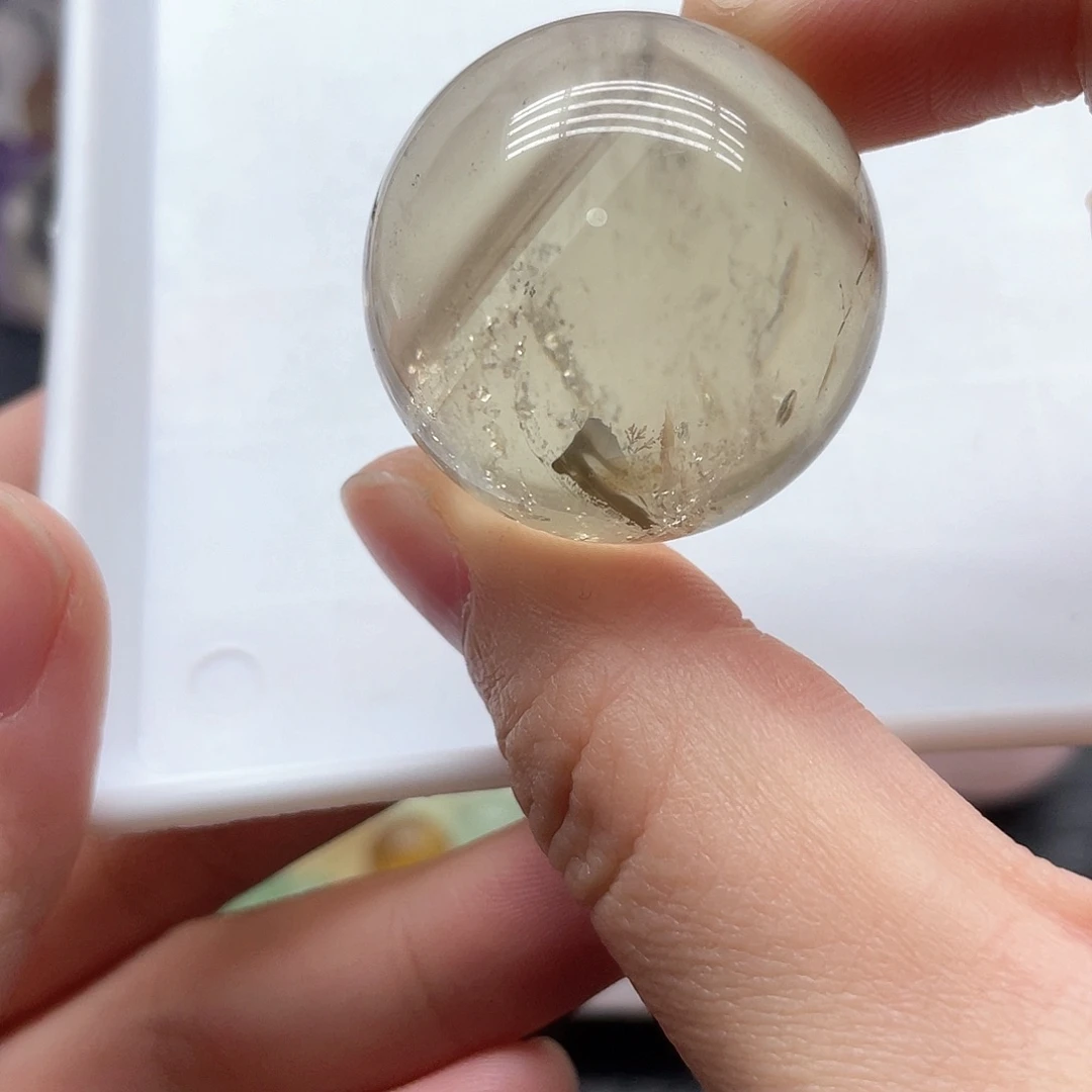 水晶未镶嵌珠宝半成品18茶黄晶球3.3cm带隐山