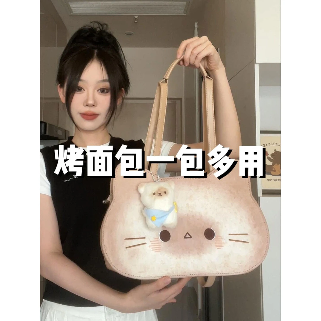可爱烤面包小猫双肩包包女2025新款小众通勤单肩斜跨包手提托特包