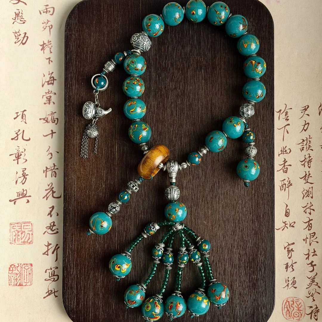 老琉璃孔雀蓝凤眼银饰手捻6010304