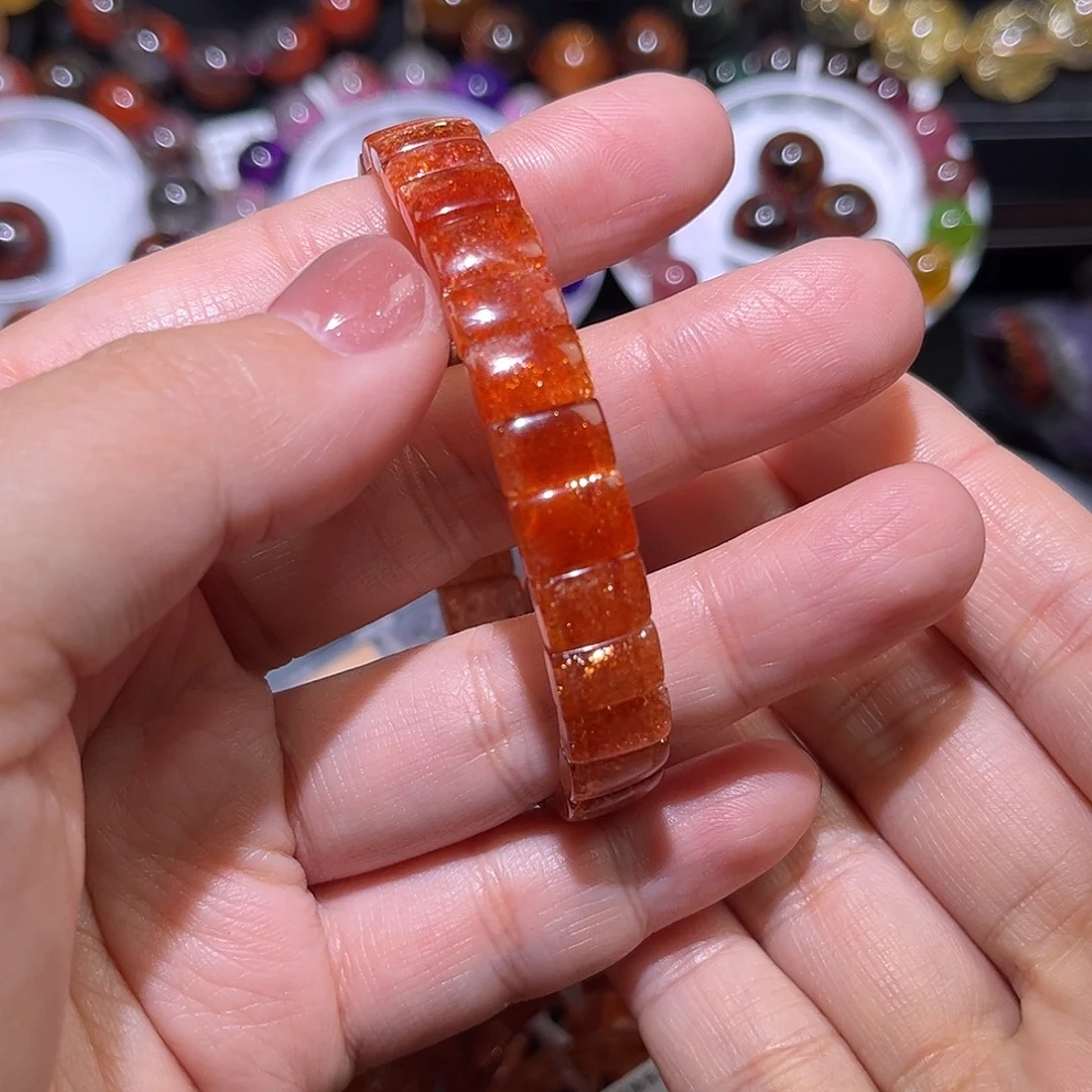 屋****日光石未镶嵌金太阳手牌