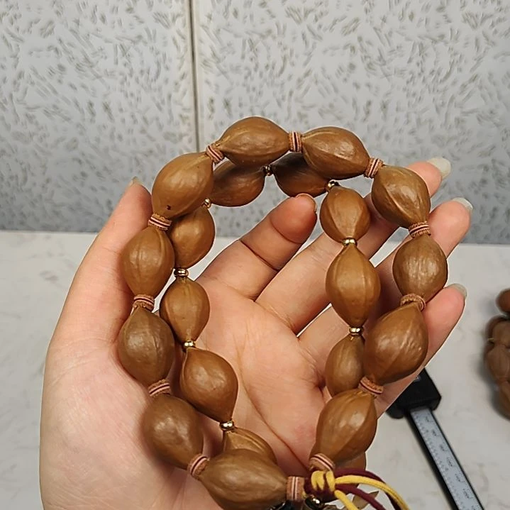 橄榄核吊坠16+尺寸油核手串原皮全品