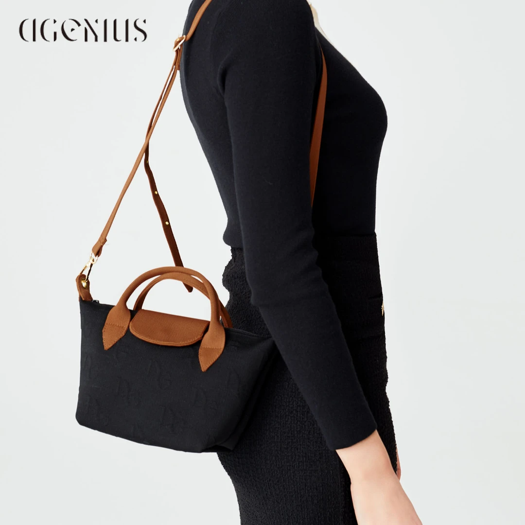 DGENIUS原创包包女2025新款黑色编织饺子包通勤手提包小众斜挎包