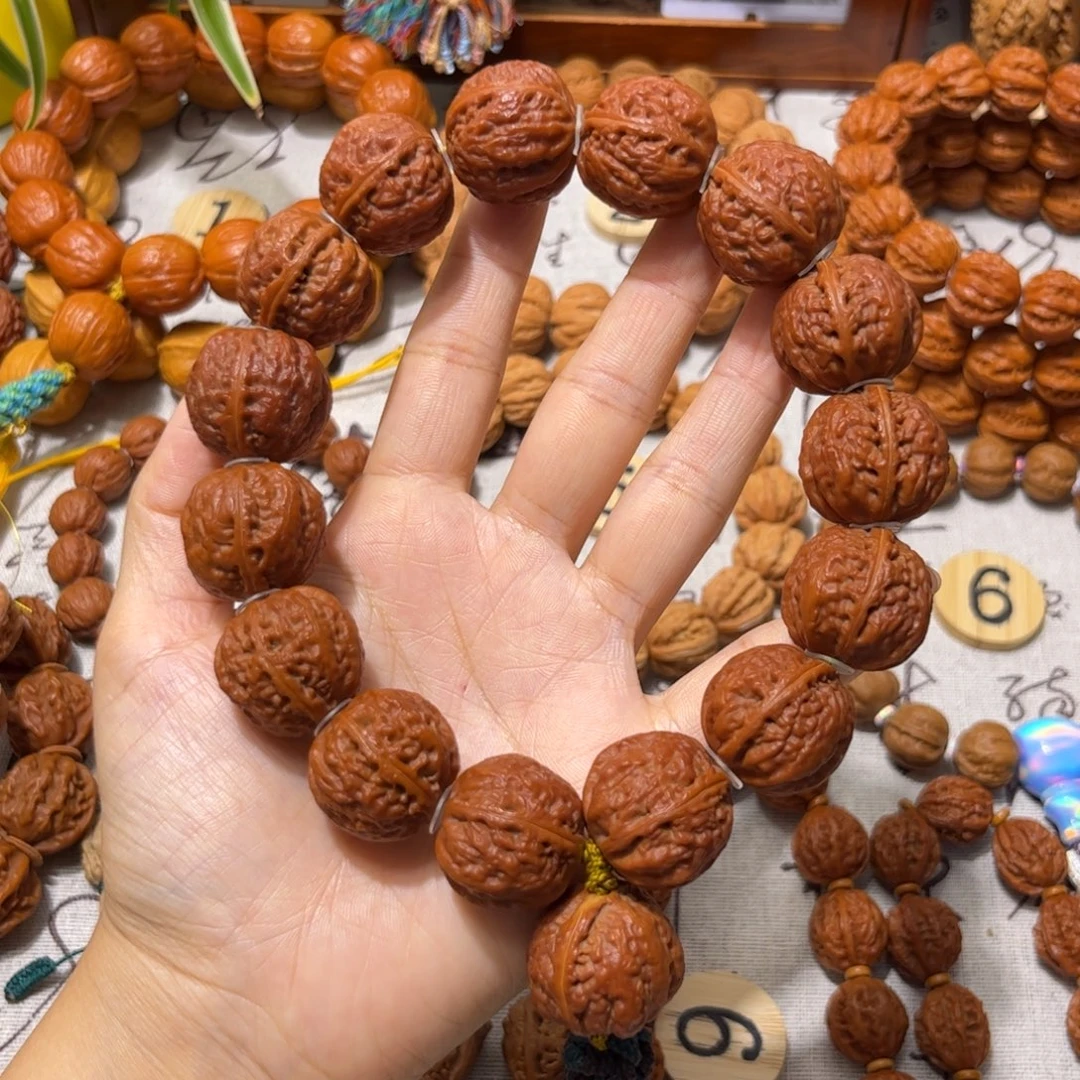 *****桃核吊坠红皮狮子头