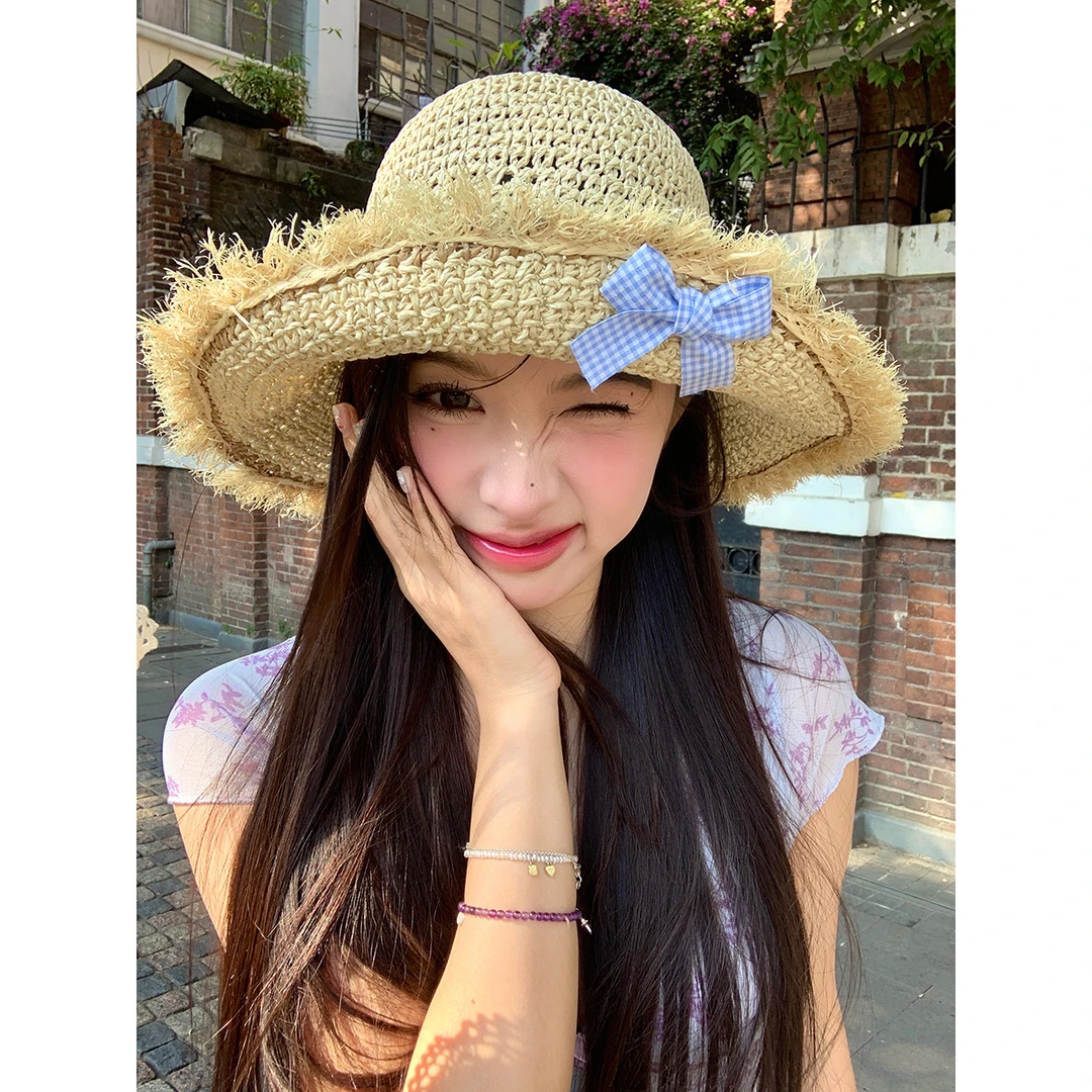 夏季防晒渔夫帽海边沙滩遮阳帽休闲百搭蝴蝶结镂空编织草帽女草编