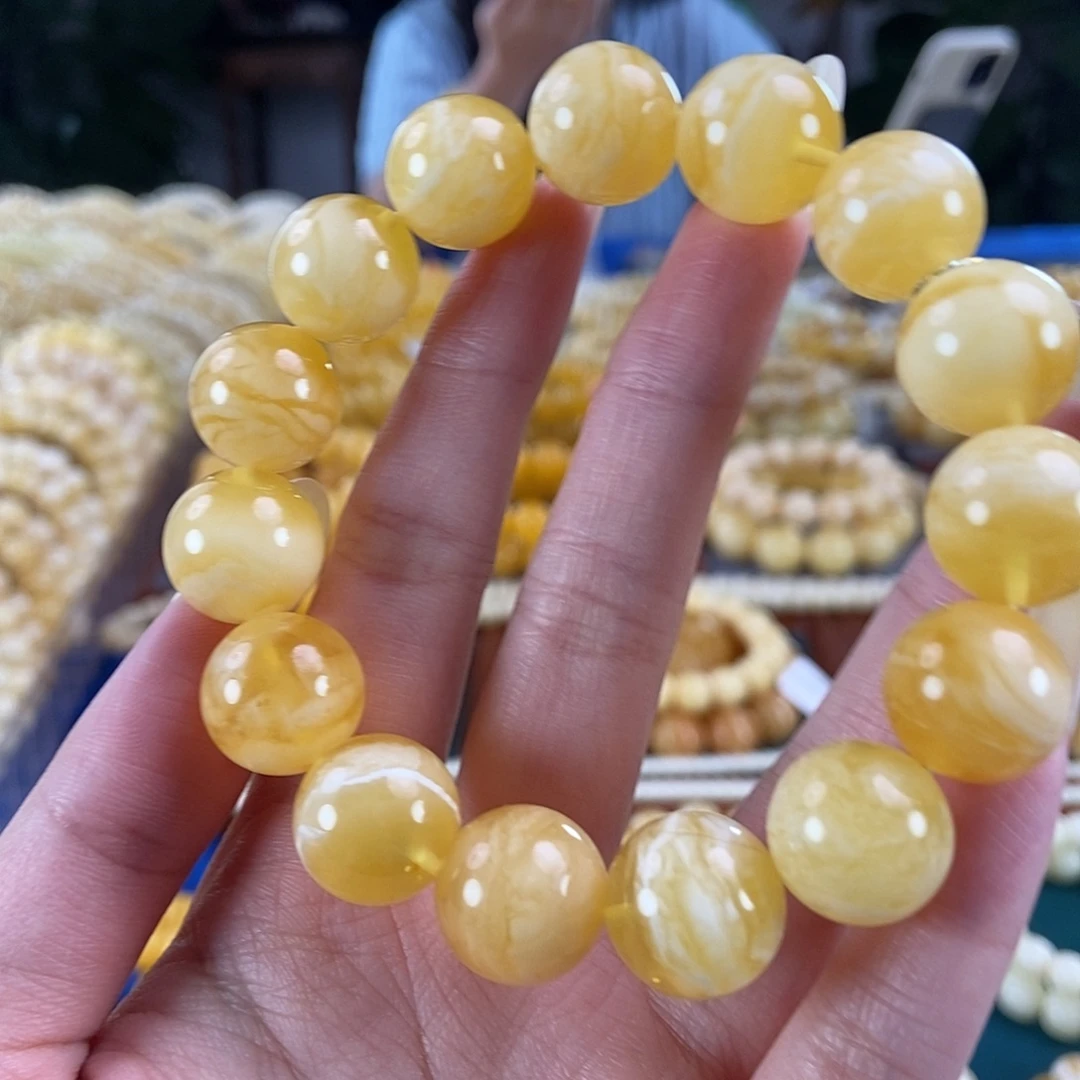 琥珀未镶嵌珠宝奇石14 26.35 金白妖花圆珠