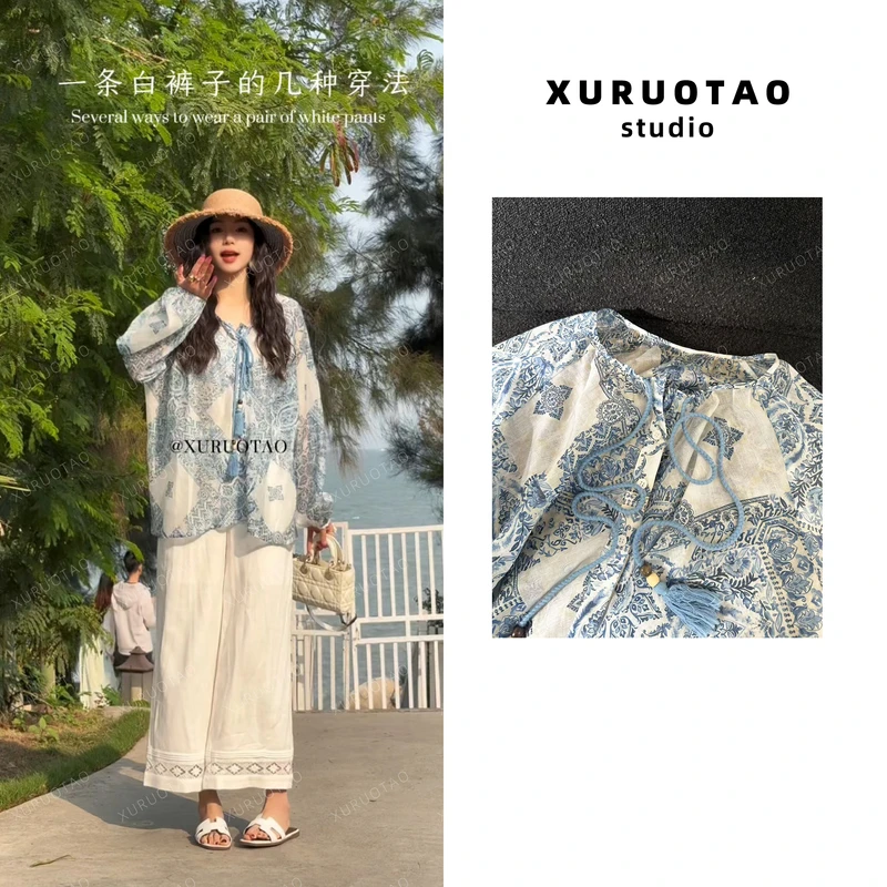 XURUOTAO 【岚风铃】 花纹绑带宽松小众设计感蓝色上衣罩衫 T5123