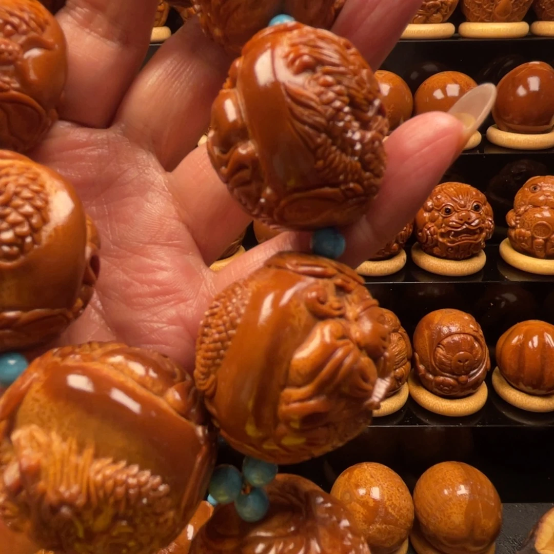 明***哥把件橄榄核手持手球