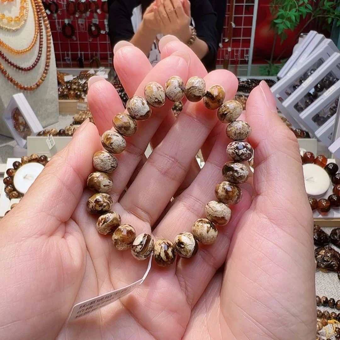 琥珀裸石未镶嵌小**?抚顺琥珀10干白花