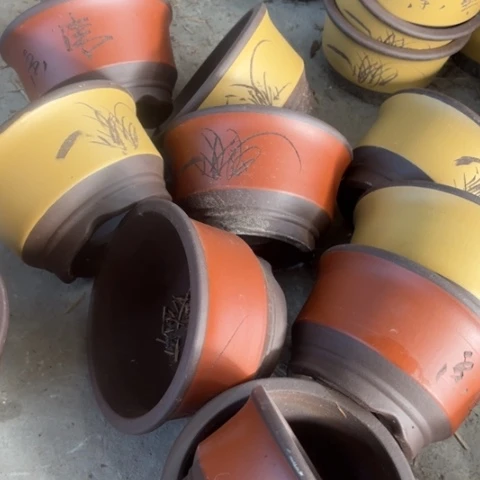 紫砂花盆100-9。  16.5-9.5