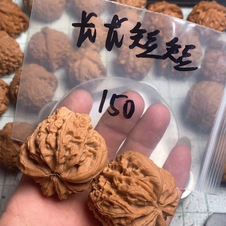 文玩核桃把件长**短核桃