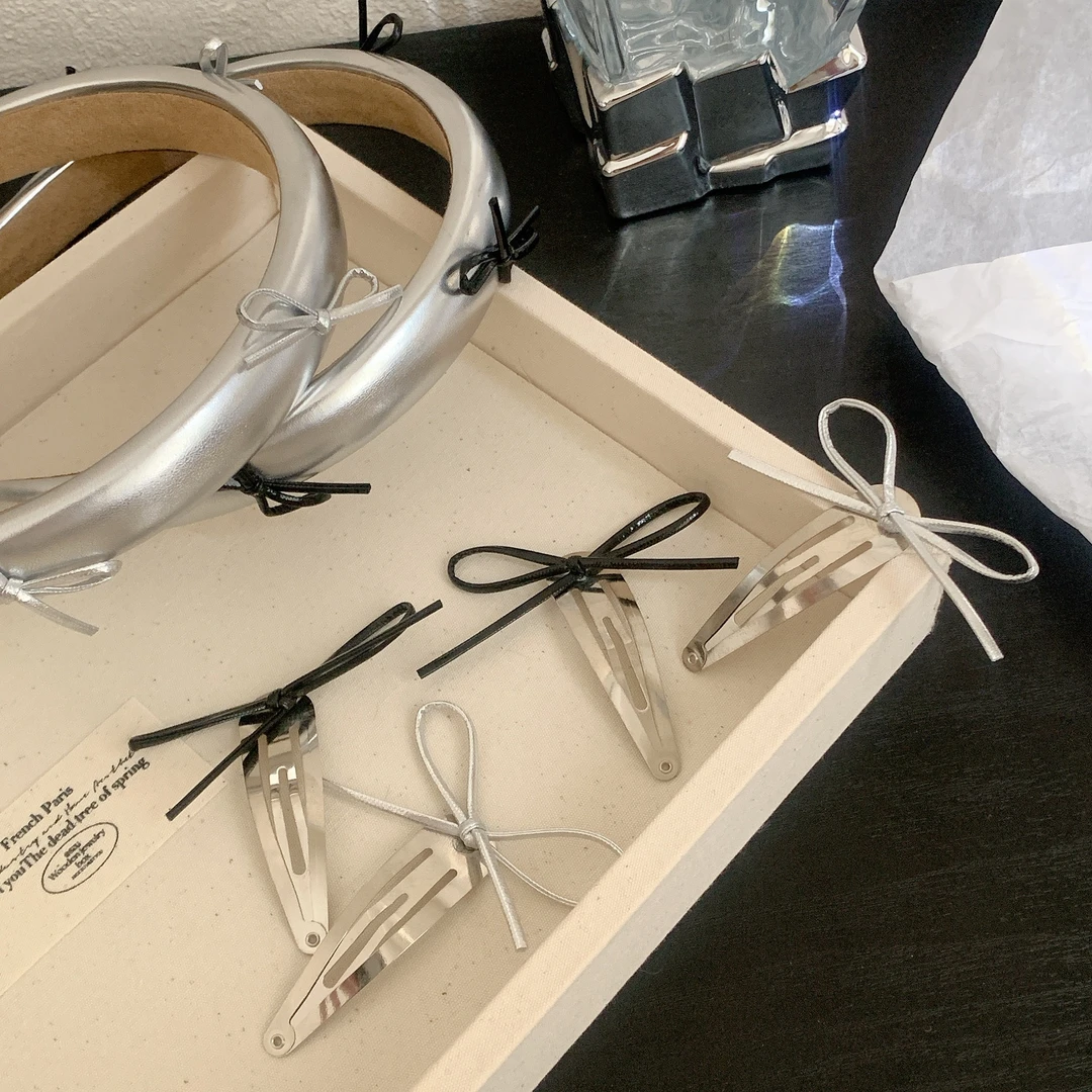 银色蝴蝶结皮质发箍女高级感小众设计ins发卡高颅顶压发头箍发饰