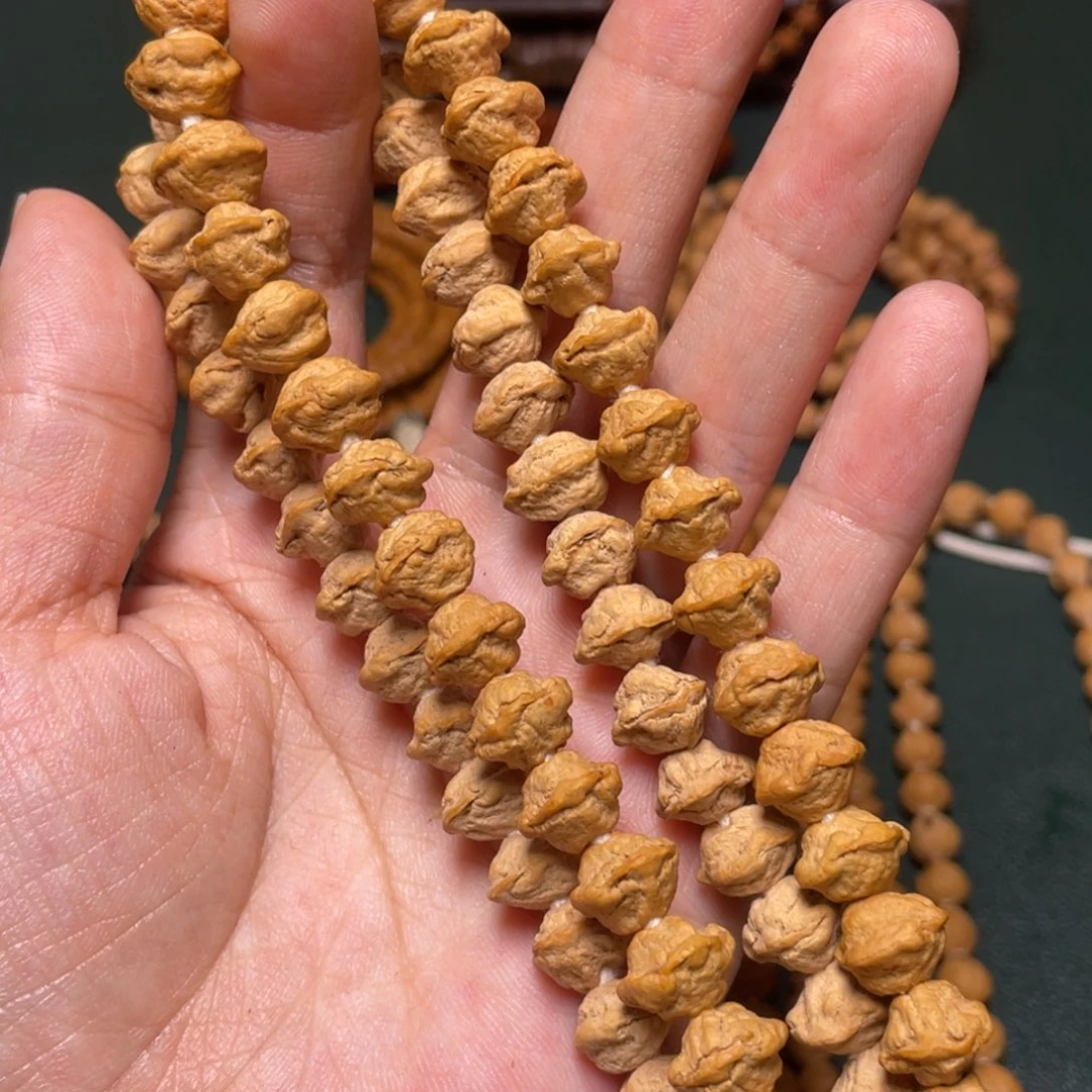 柏香籽/百香籽吊坠脸谱手持