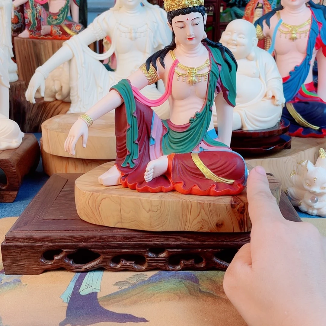沐***雲石材自在观音摆件
