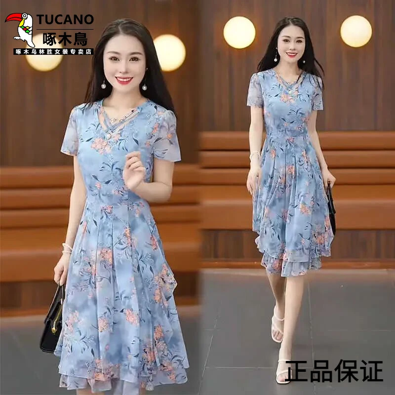 啄木鸟小个子碎花连衣裙女2025夏季新款气质洋气显瘦短袖中长款雪