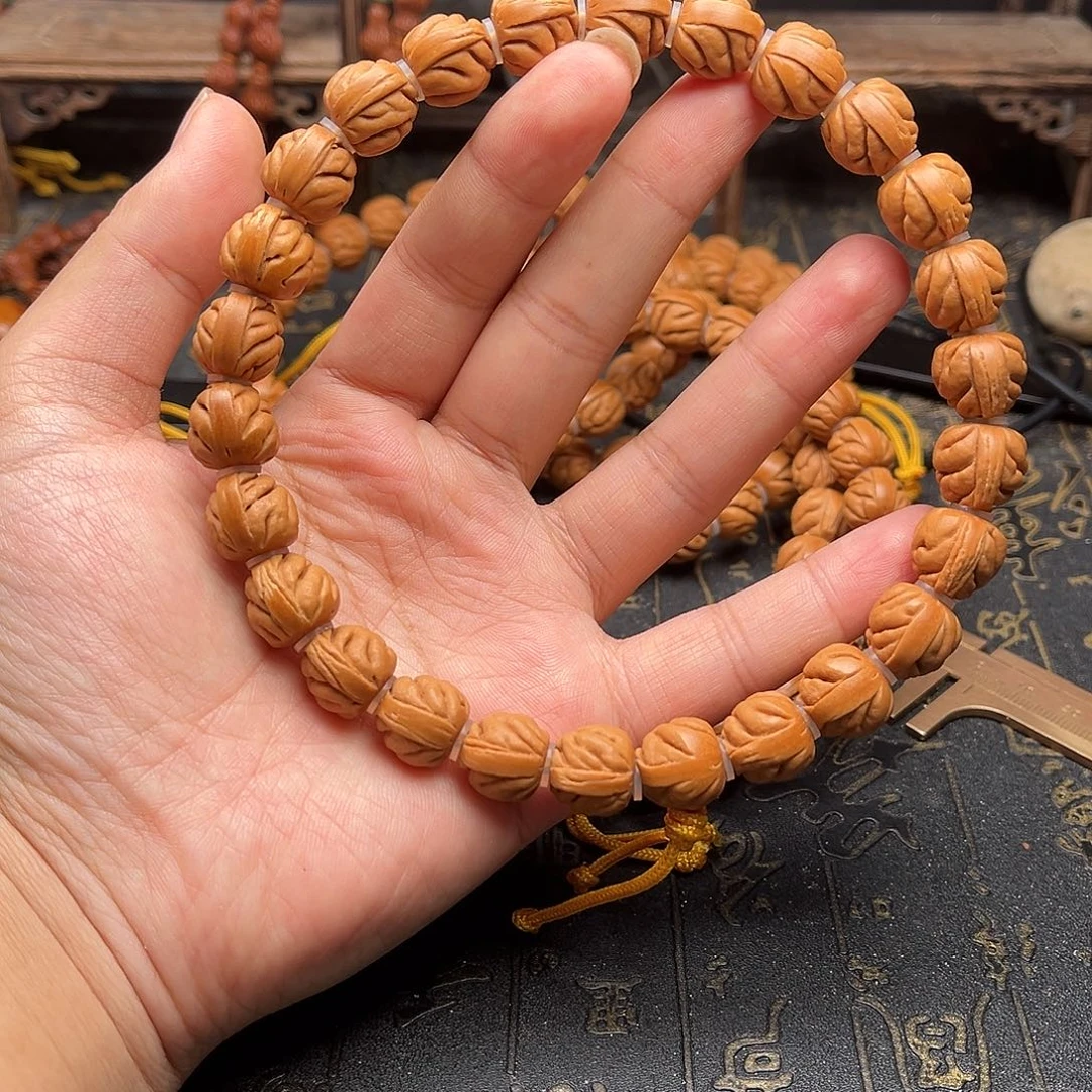 吊坠桃核大肠手持