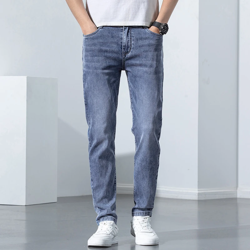 工厂直发~蓝色弹力修身小脚水洗休闲新塘牛仔长裤2025新款男夏薄