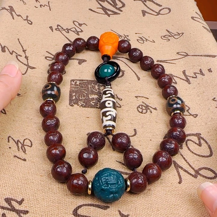 凤眼菩提吊坠手持