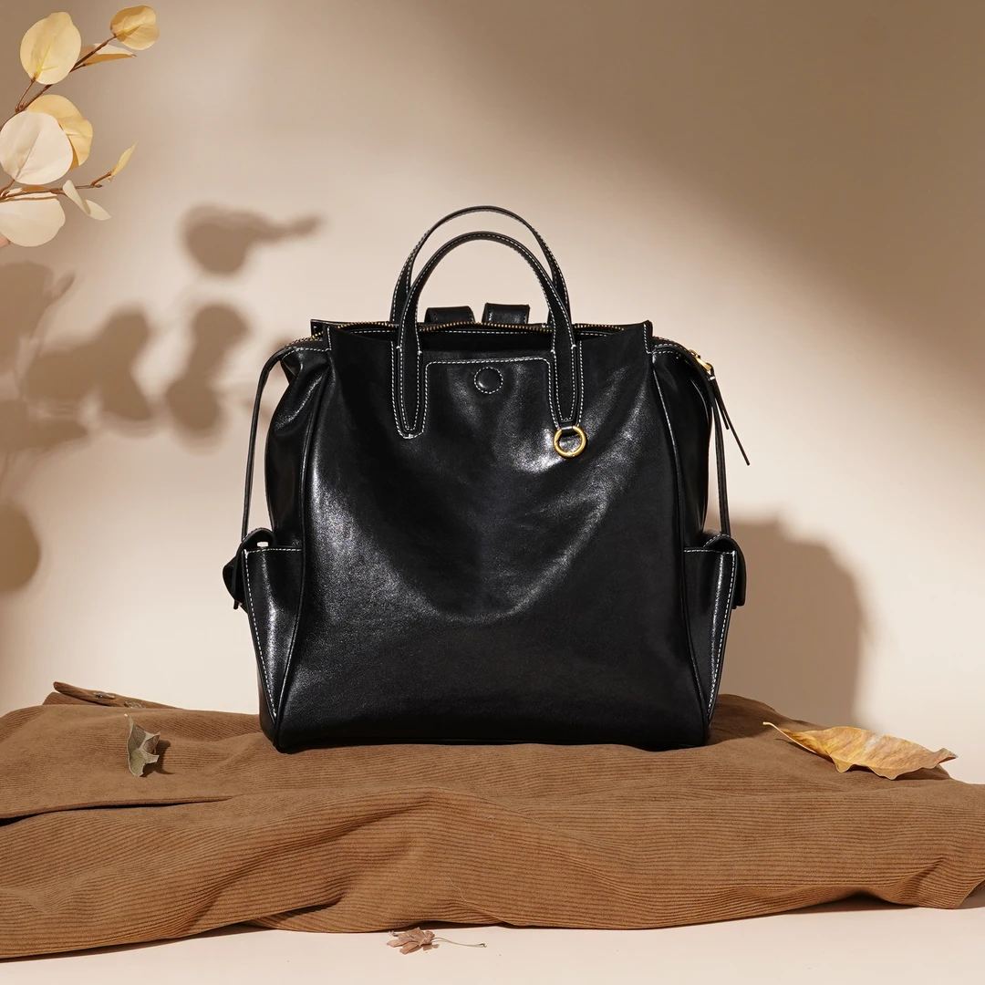 岩牛2025设计款时尚小众双肩包大容量复古旅行通勤大包YN3559