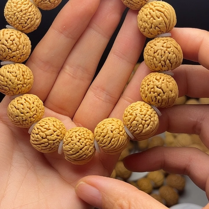 刘***贵桃核吊坠桃核手串