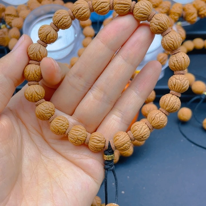 老***。吊坠桃核见见见见见5