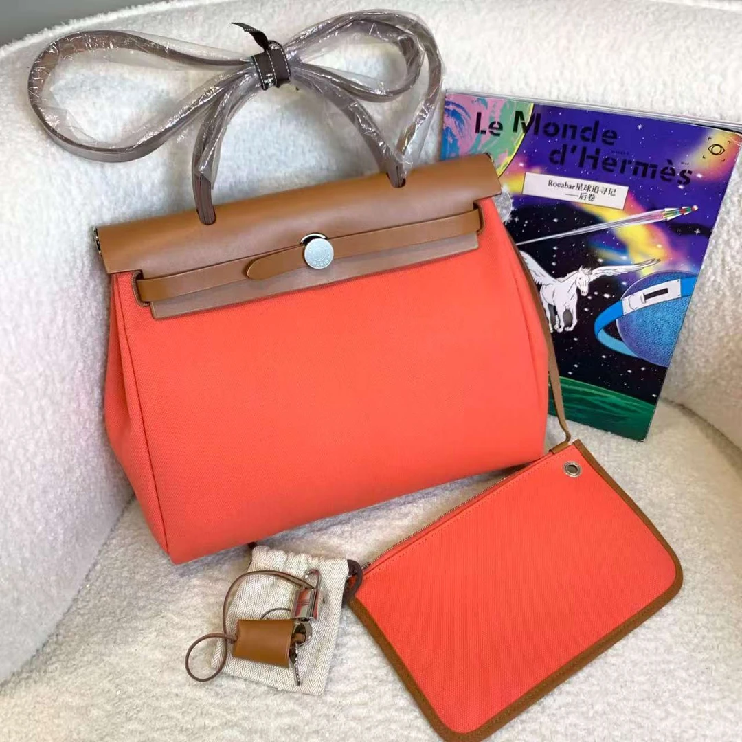 99新 Hermes/爱马仕 橘红色银扣herbag31B刻/ 89025383/代卖服务