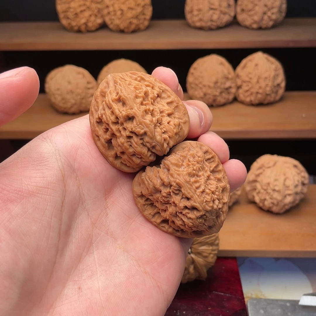 文玩核桃把件40头货红皮高炮三角南疆石
