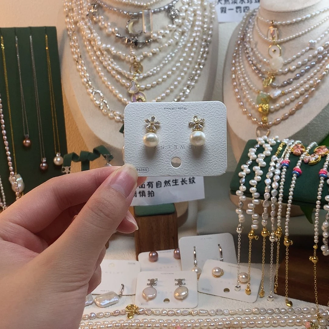 银S925镶嵌淡水珍珠太阳花耳坠