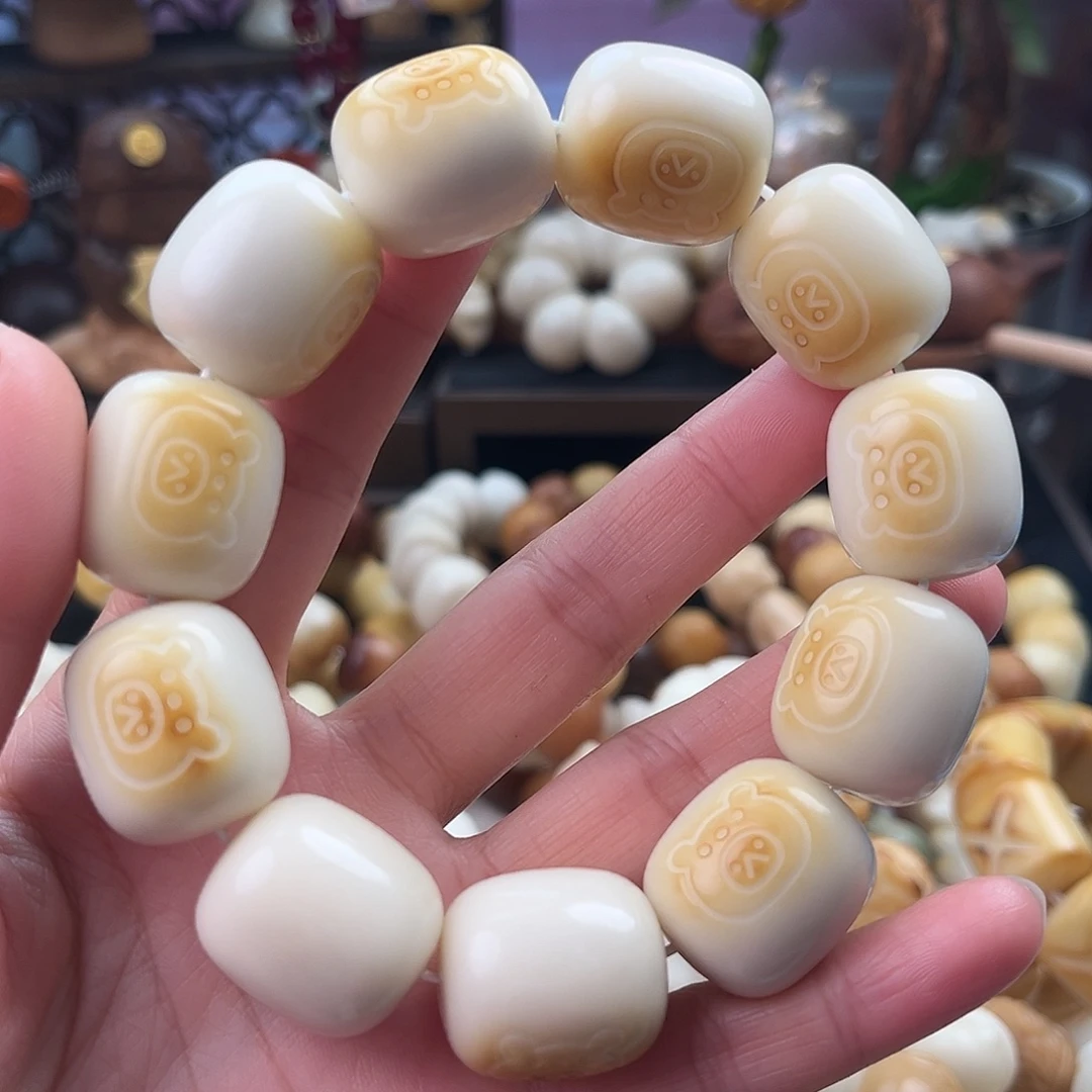 菩提根/象牙果手串-08牙果桶珠年糕熊头