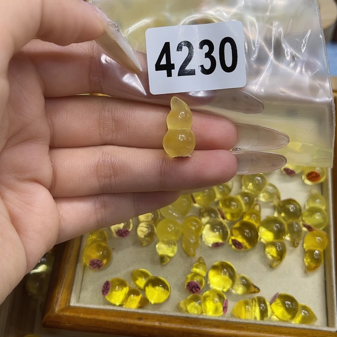 桃***°琥珀未镶嵌珠宝奇石