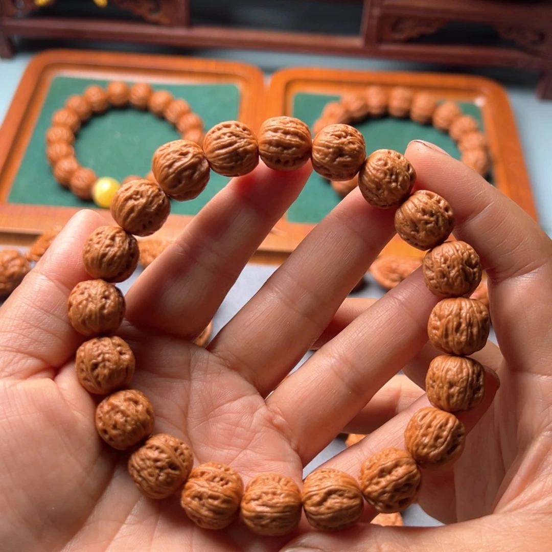 文玩核桃吊坠你*。野生小核桃