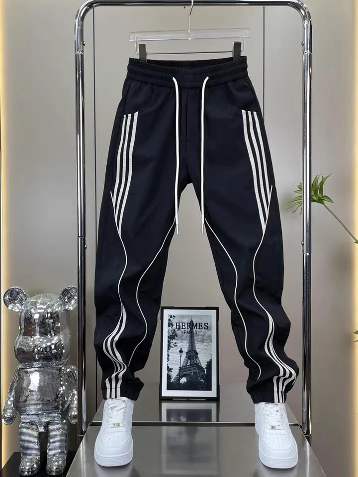 男士时尚撞色束脚裤拼接防风刺绣休闲裤百搭裤子潮流卫裤