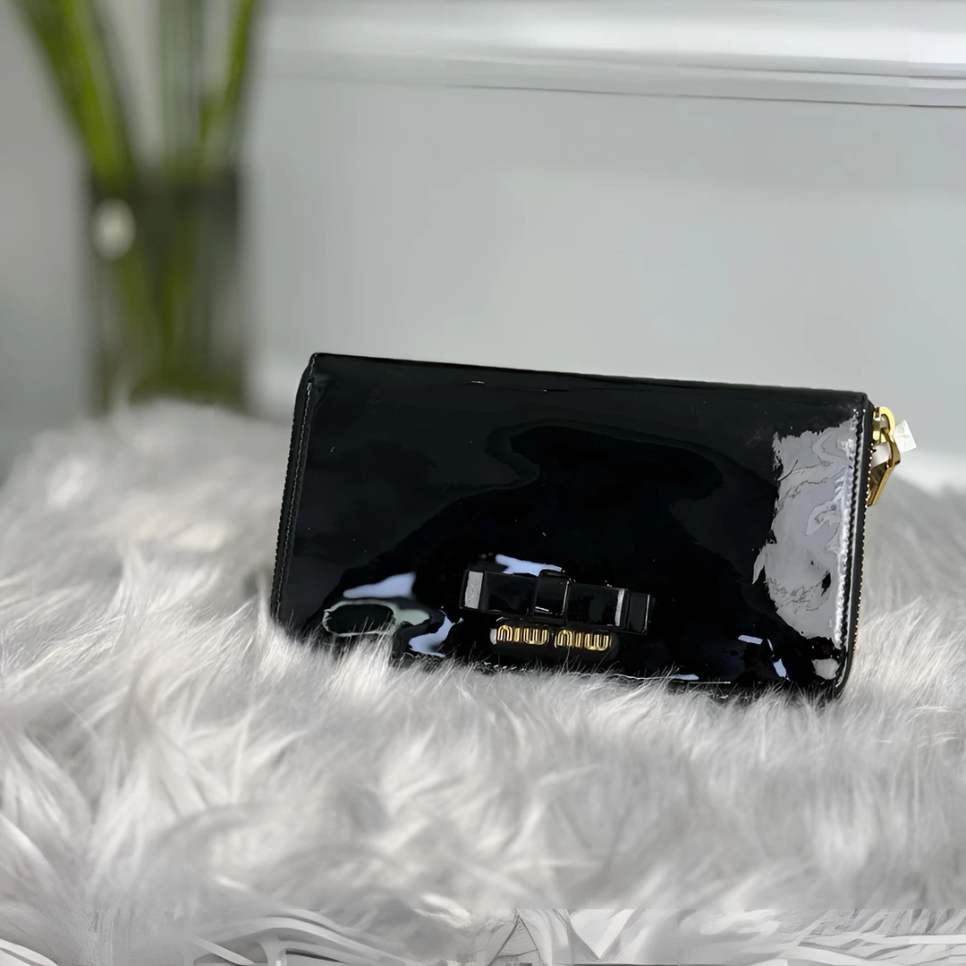 95新 MIU MIU/缪缪 钱包手拿包黑色/SS3017