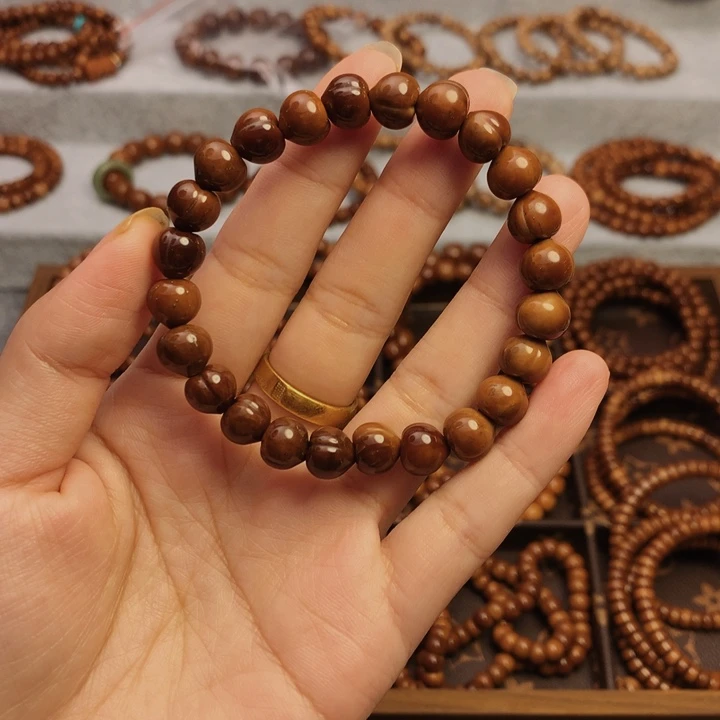 果皮天然库克精挑屁桃8*9单圈手串