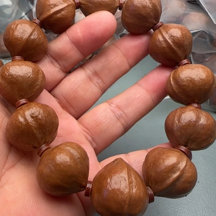 冬***九手串橄榄核橄榄核原皮铁核