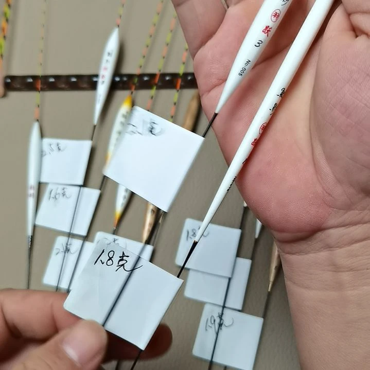 执***手孔雀羽鳞影带壳2支012