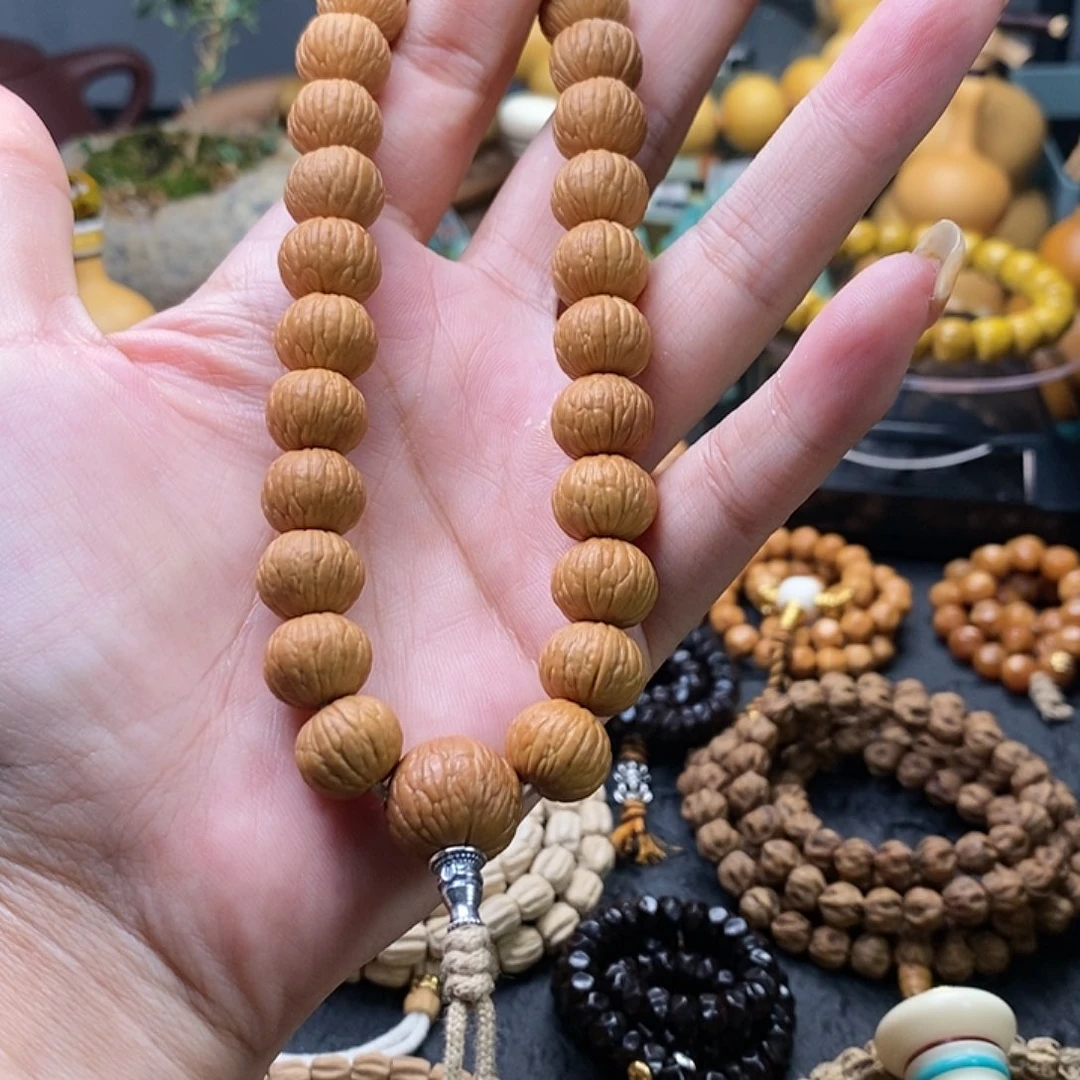 柏香籽/百香籽手串止*.