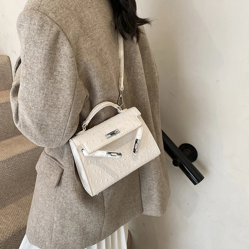 左九女包复古简约鸵鸟纹凯莉包包女2025新款纯色手提包潮流时尚单
