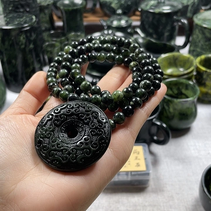 读***你蛇纹石玉合金卡8平安扣