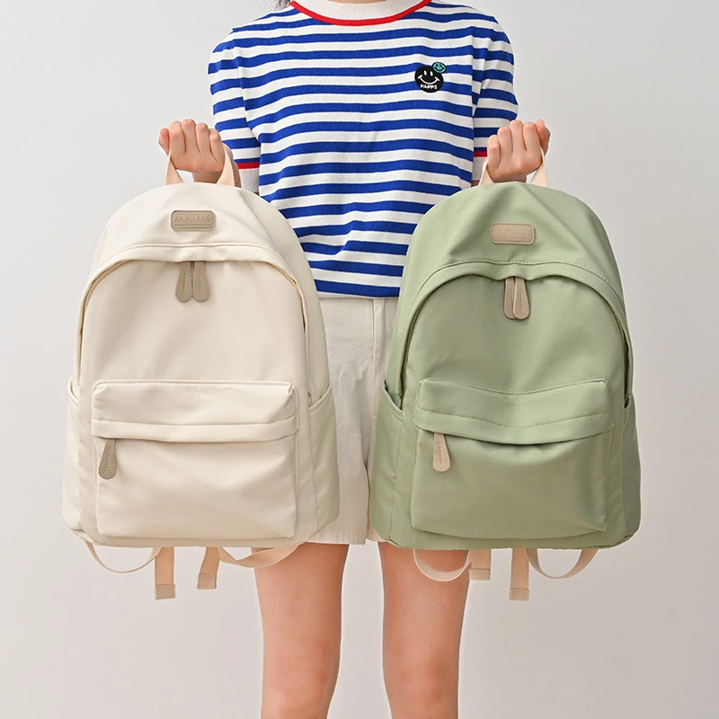 时尚简约双肩包大容量背包女初中生高中大学生森系书包男一件代发