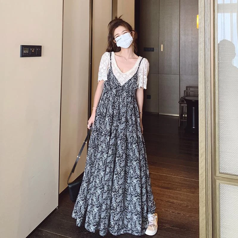 法式复古吊带连衣裙女夏2025度假风边气质高级感黑色碎花裙