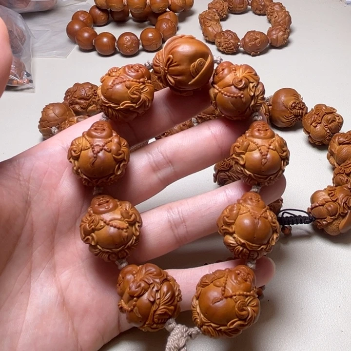 小***虎吊坠橄榄核童子弥勒