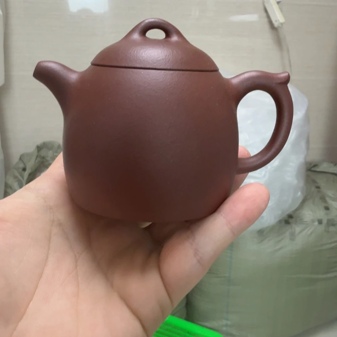 茶杯紫砂微瑕的壶