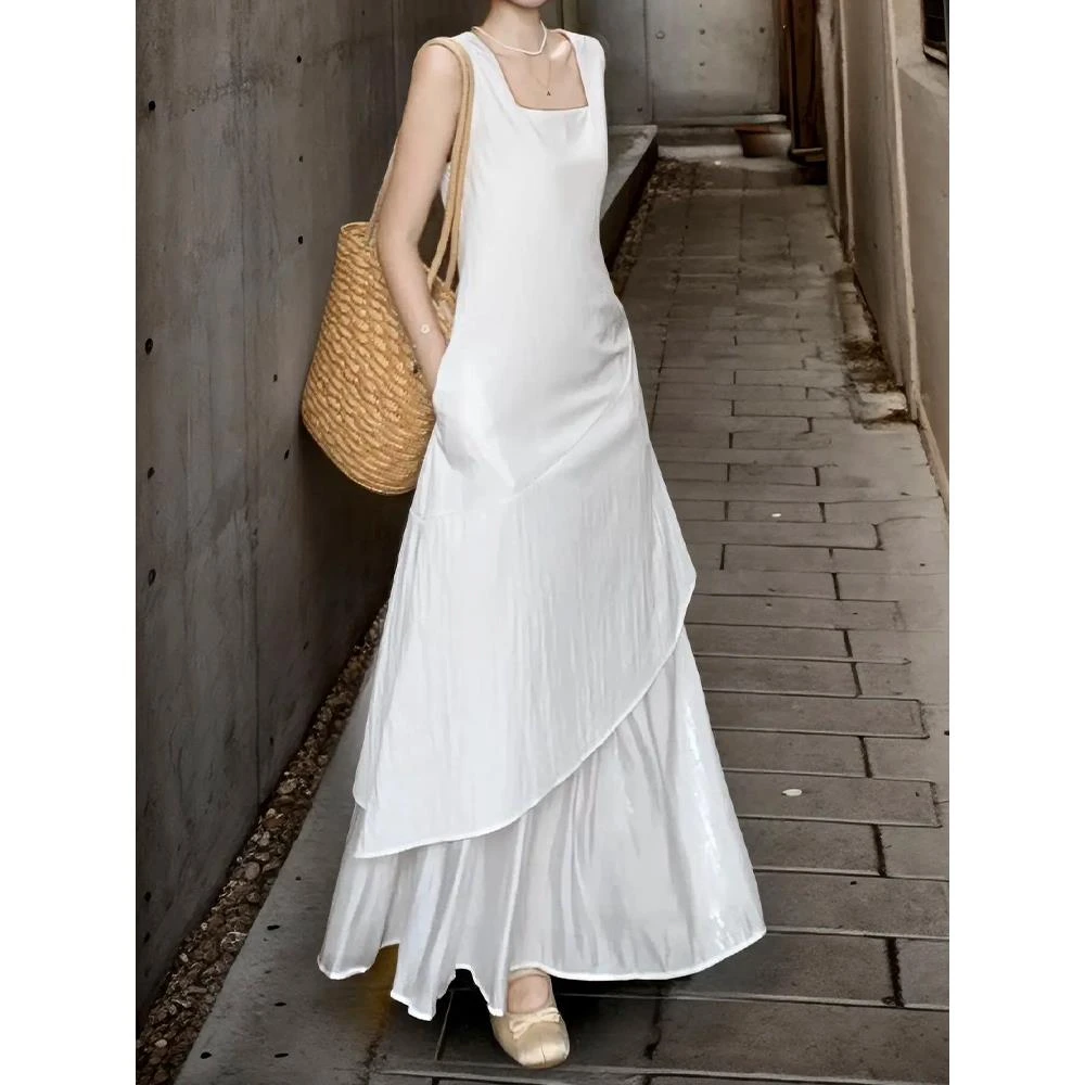 2025新款法式初恋白色吊带连衣裙子女夏季小众设计气质高级感长裙