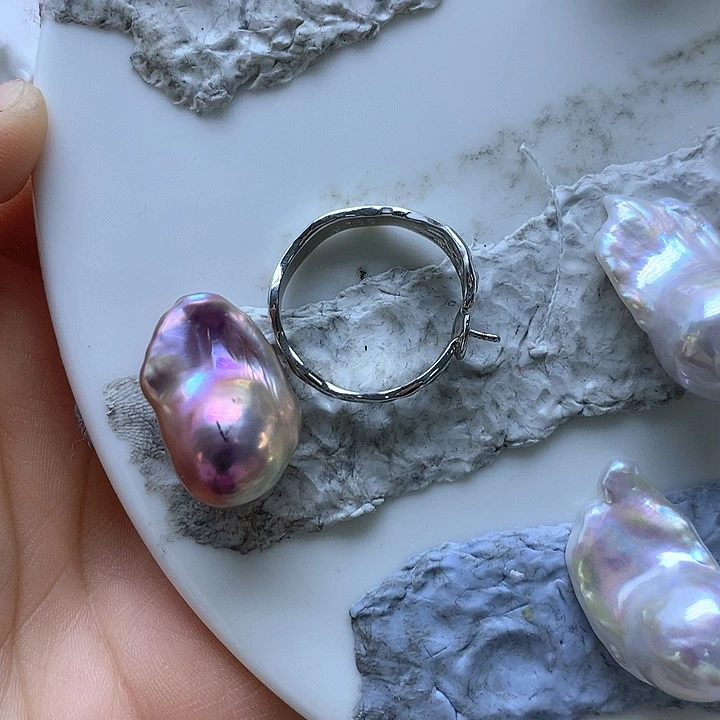 淡水珍珠耳饰银S925镶嵌姐****脸