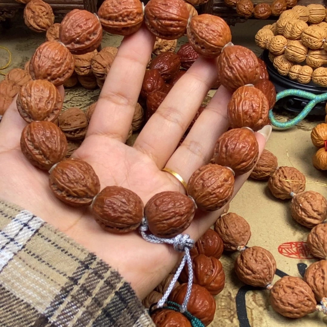 浪***哥文玩核桃吊坠钱袋子手串文玩核桃