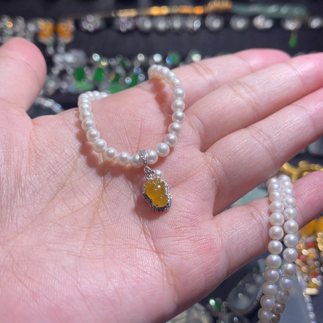 翡翠吊坠(不含链)18K金镶嵌黄翡金鱼