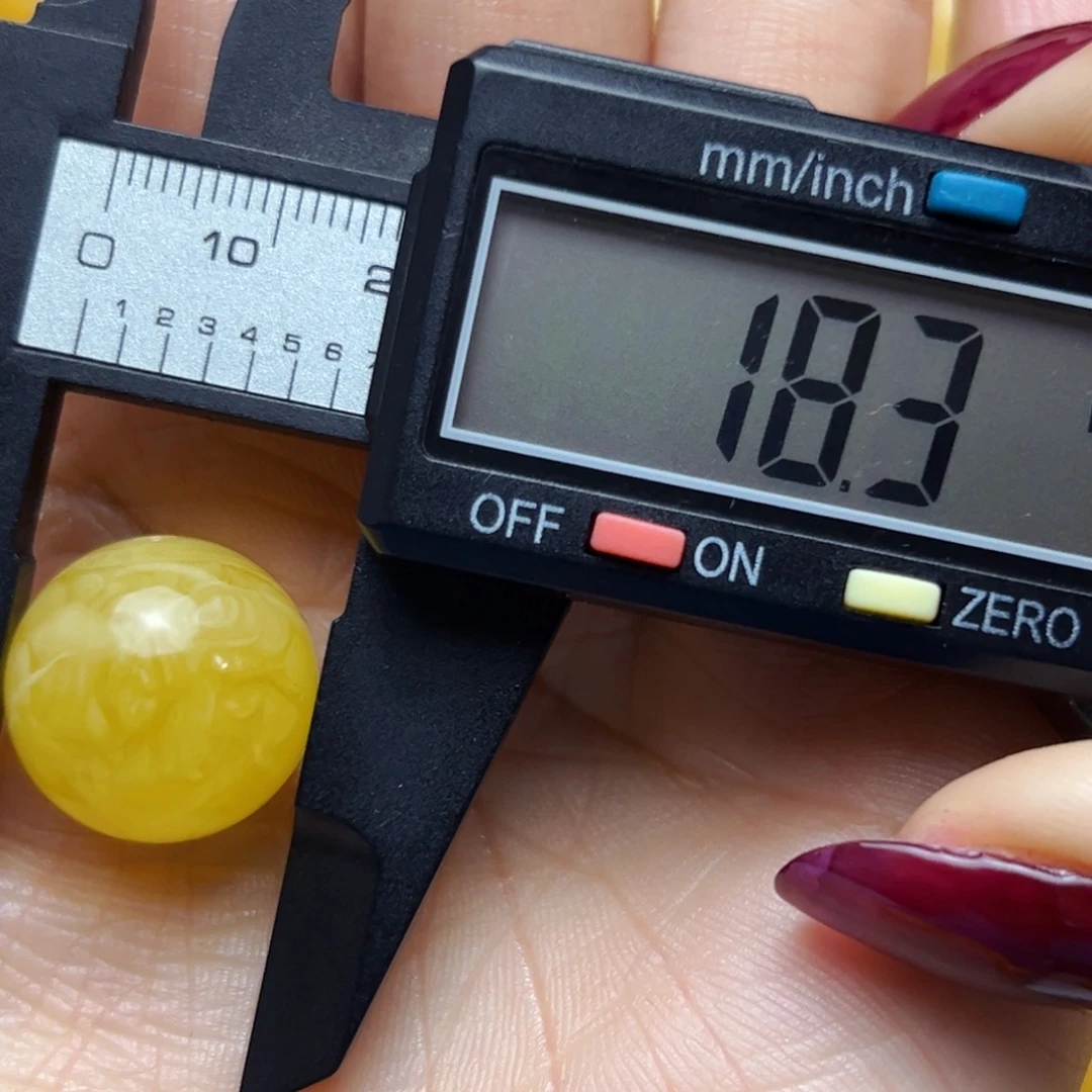 蜜蜡裸石未镶嵌月****足18mm瑕疵单珠