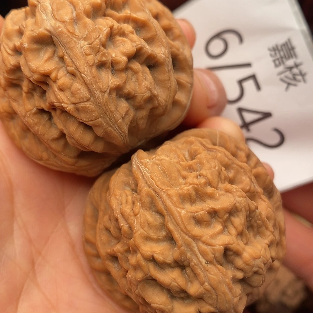 淡***然把件文玩核桃47.8红锦鲤