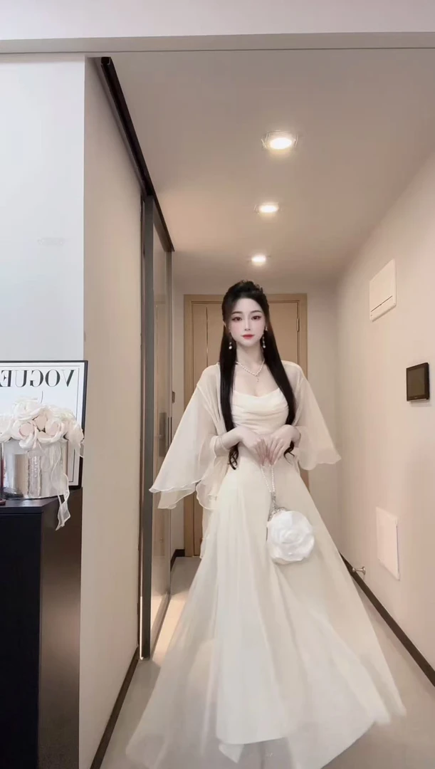 轻熟高级感气质连衣裙女2025夏季新款防晒开衫小众收腰长裙两件套