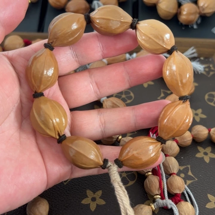 1928正四花梅林铁核手串